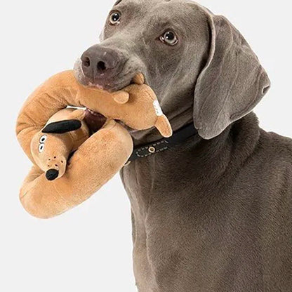 Long, thin, talking dachshund plush toy; makes sounds; a dog doll that entertains and amuses.